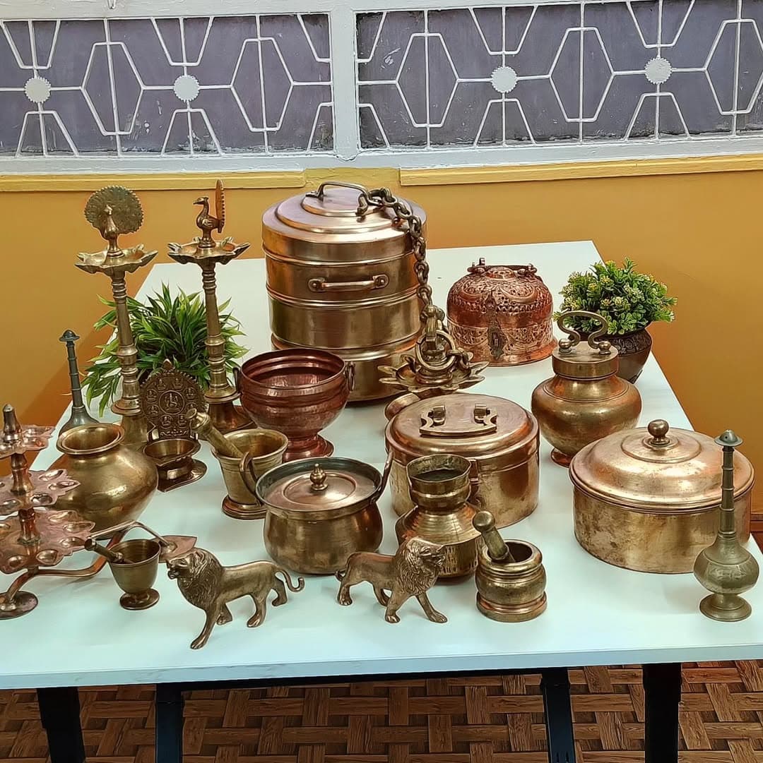 Shudyam artisan working on a brass product